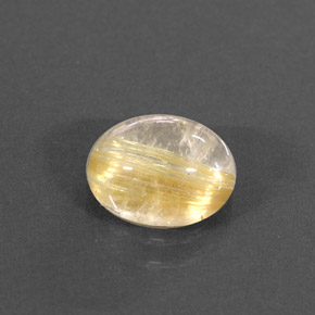 1.55カラットの天然無色＆ゴールドルチルクォーツ（8×6.4 mm・透明）