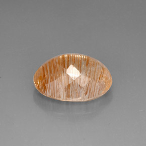22.42カラットの天然無色＆ゴールドルチルクォーツ（21×16.4 mm・透明）