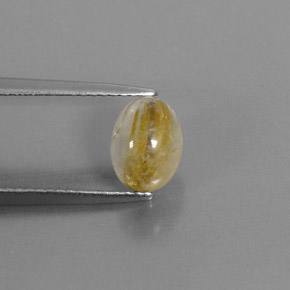 1.73カラットの天然無色＆ゴールドルチルクォーツ（8.1×6.1 mm・透明）