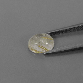 1.47カラットの天然無色＆ゴールドルチルクォーツ（7.9×6.2 mm・透明）