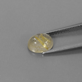 1.48カラットの天然無色＆ゴールドルチルクォーツ（7.9×6.2 mm・透明）