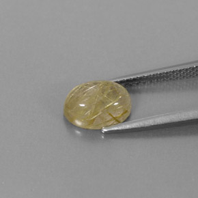 1.82カラットの天然無色＆ゴールドルチルクォーツ（8.6×6.4 mm・透明）