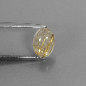 1.61カラットの天然無色＆ゴールドルチルクォーツ（8.5×6.3 mm・透明）