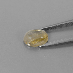 1.61カラットの天然無色＆ゴールドルチルクォーツ（8.5×6.3 mm・透明）