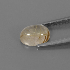 1.47カラットの天然無色＆ゴールドルチルクォーツ（8.2×6 mm・透明）