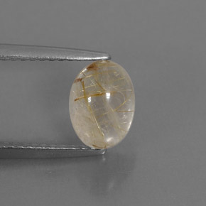 1.47カラットの天然無色＆ゴールドルチルクォーツ（8.2×6 mm・透明）
