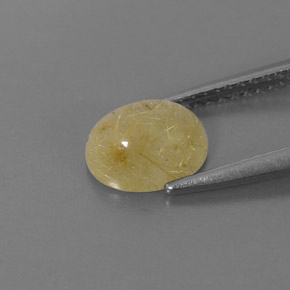 1.45カラットの天然無色＆ゴールドルチルクォーツ（8×6.2 mm・透明）
