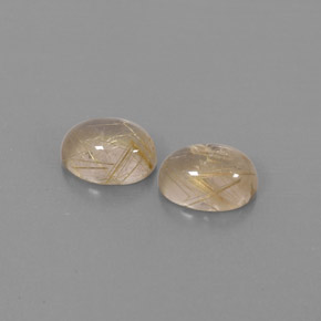 カラットの天然無色＆ゴールドルチルクォーツ（7.9×6.1 mm・透明）
