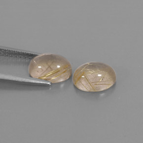 カラットの天然無色＆ゴールドルチルクォーツ（7.9×6.1 mm・透明）