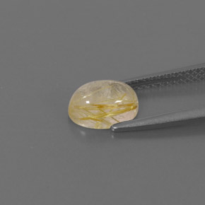 1.42カラットの天然無色＆ゴールドルチルクォーツ（8.1×6 mm・透明）