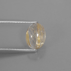 1.63カラットの天然無色＆ゴールドルチルクォーツ（8.4×6.3 mm・透明）