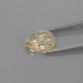 1.63カラットの天然無色＆ゴールドルチルクォーツ（8.4×6.3 mm・透明）