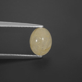 1.63カラットの天然無色＆ゴールドルチルクォーツ（8×6.3 mm・透明）