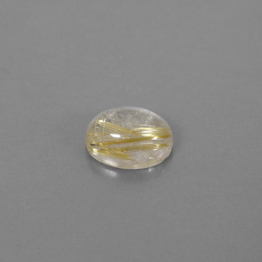 1.69カラットの天然無色＆ゴールドルチルクォーツ（8.5×6.4 mm・透明）