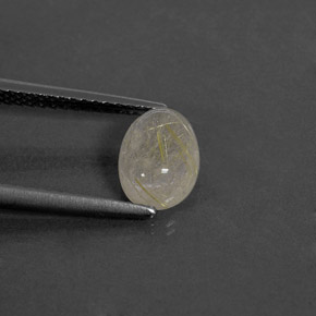 1.46カラットの天然無色＆ゴールドルチルクォーツ（8.1×6 mm・透明）