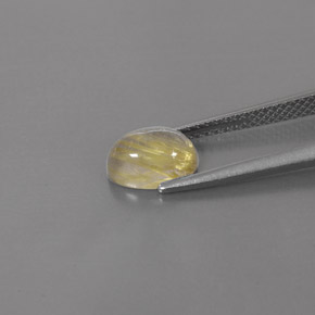 1.45カラットの天然無色＆ゴールドルチルクォーツ（8×5.9 mm・透明）