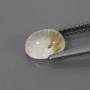 1.45カラットの天然無色＆ゴールドルチルクォーツ（7.7×6.1 mm・透明）