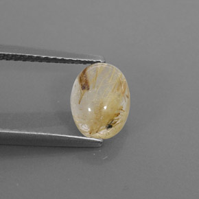 1.65カラットの天然無色＆ゴールドルチルクォーツ（8.3×6.3 mm・透明）