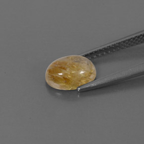 1.48カラットの天然無色＆ゴールドルチルクォーツ（8.3×6.2 mm・透明）