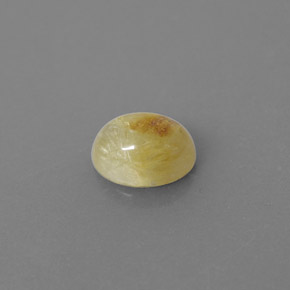 1.46カラットの天然無色＆ゴールドルチルクォーツ（7.8×6.2 mm・透明）