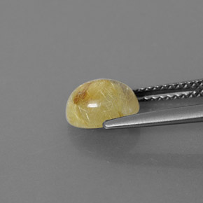 1.46カラットの天然無色＆ゴールドルチルクォーツ（7.8×6.2 mm・透明）