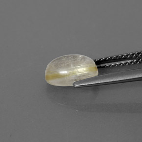 1.52カラットの天然無色＆ゴールドルチルクォーツ（8.3×6.2 mm・透明）
