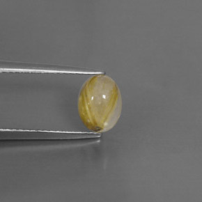 1.44カラットの天然無色＆ゴールドルチルクォーツ（7.9×6 mm・透明）
