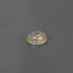 1.33カラットの天然無色＆ゴールドルチルクォーツ（8×6 mm・透明）