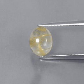 1.51カラットの天然無色＆ゴールドルチルクォーツ（8.2×6.5 mm・オーバルカット）