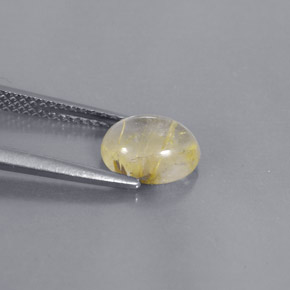 1.51カラットの天然無色＆ゴールドルチルクォーツ（8.2×6.5 mm・オーバルカット）