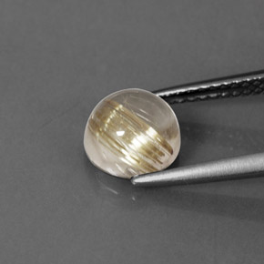 1.99カラットの天然無色＆ゴールドルチルクォーツ（7.29 mm・ラウンドカット）