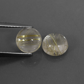 カラットの天然無色＆ゴールドルチルクォーツ（7.12 mm・ラウンドカット）