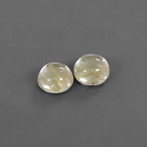 カラットの天然無色＆ゴールドルチルクォーツ（8.04 mm・ラウンドカット）