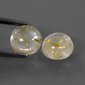 カラットの天然無色＆ゴールドルチルクォーツ（7.13 mm・ラウンドカット）
