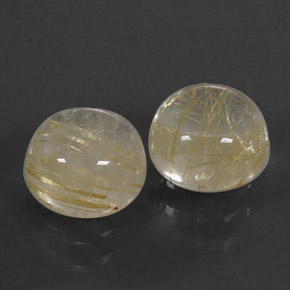 カラットの天然無色＆ゴールドルチルクォーツ（7.06 mm・ラウンドカット）