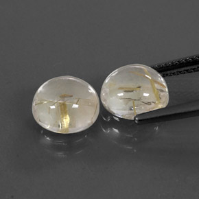 カラットの天然無色＆ゴールドルチルクォーツ（8.09 mm・ラウンドカット）