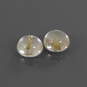カラットの天然無色＆ゴールドルチルクォーツ（7.13 mm・ラウンドカット）