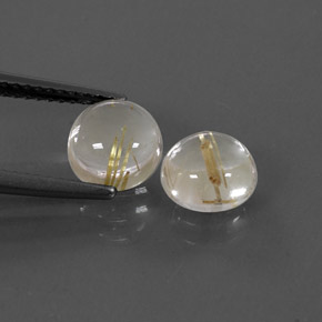 カラットの天然無色＆ゴールドルチルクォーツ（7.13 mm・ラウンドカット）