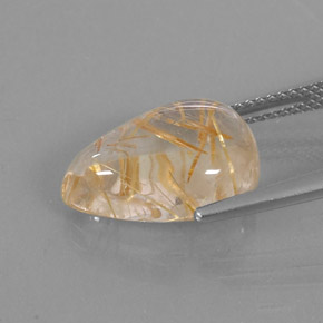 7.12カラットの天然無色＆ゴールドルチルクォーツ（15.2×10.7 mm・洋梨の形）