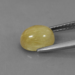 1.89カラットの天然無色＆ゴールドルチルクォーツ（8.3×6.6 mm・オーバルカット）
