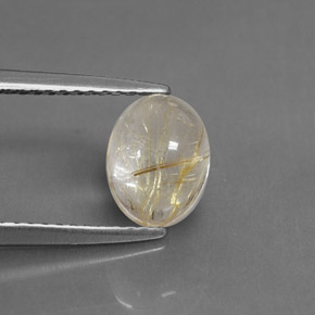 1.54カラットの天然無色＆ゴールドルチルクォーツ（8×6.1 mm・透明）