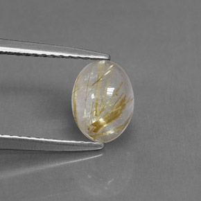 1.24カラットの天然無色＆ゴールドルチルクォーツ（7.9×6 mm・透明）