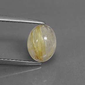 1.30カラットの天然無色＆ゴールドルチルクォーツ（8.1×6.2 mm・透明）