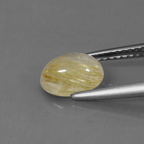 1.30カラットの天然無色＆ゴールドルチルクォーツ（8.1×6.2 mm・透明）