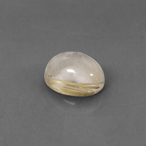 1.56カラットの天然無色＆ゴールドルチルクォーツ（8×6.2 mm・透明）