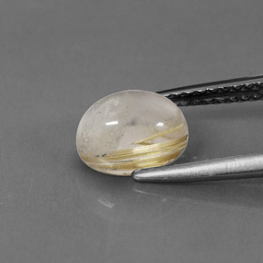 1.56カラットの天然無色＆ゴールドルチルクォーツ（8×6.2 mm・透明）