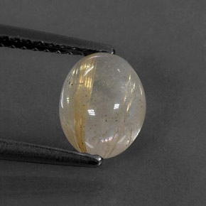 1.59カラットの天然無色＆ゴールドルチルクォーツ（8×6.3 mm・透明）