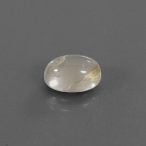 1.41カラットの天然無色＆ゴールドルチルクォーツ（8.2×6 mm・オーバルカット）