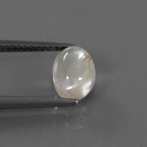 1.41カラットの天然無色＆ゴールドルチルクォーツ（8.2×6 mm・オーバルカット）