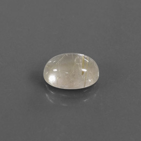 1.40カラットの天然無色＆ゴールドルチルクォーツ（8.3×6.1 mm・透明）